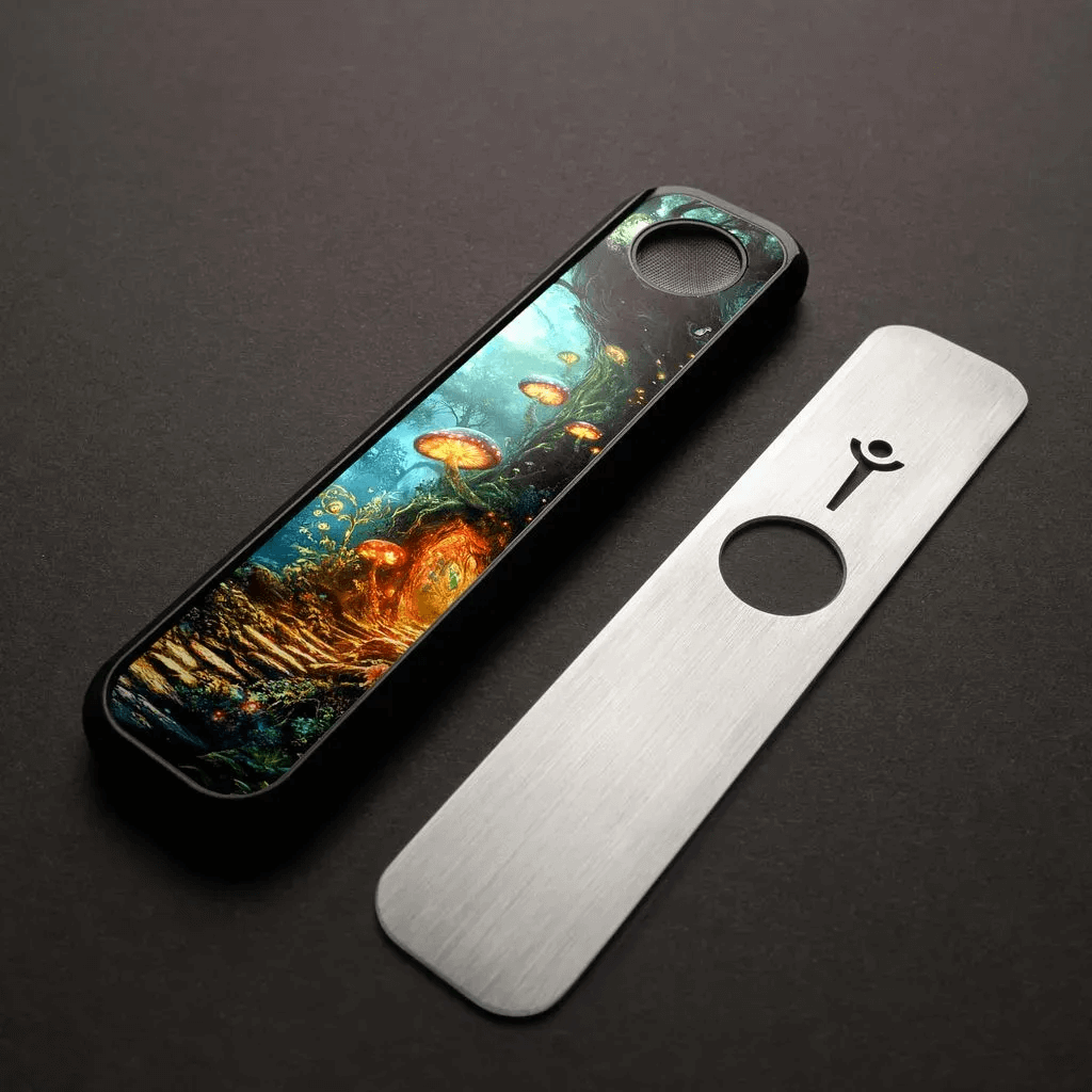 Genius Pipe – Enchanted Entrance edition with magnetic slider removed, resting beside pipe on felt surface.