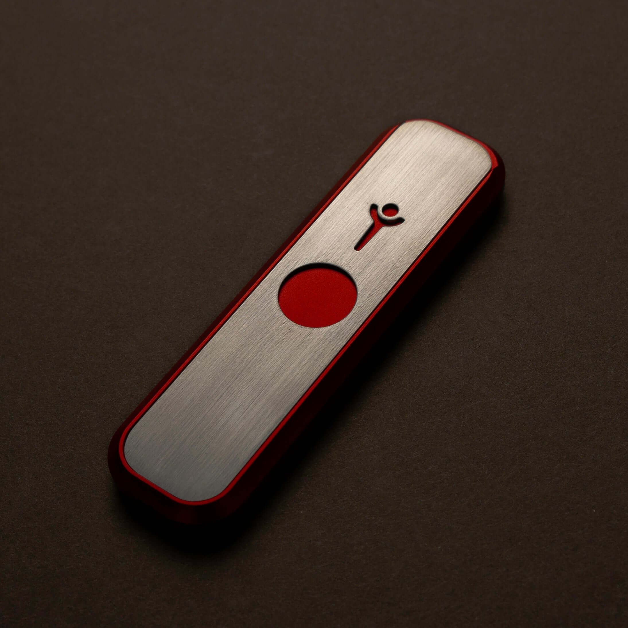Genius Pipe Mini Red fully assembled on felt tabletop β closed view.
