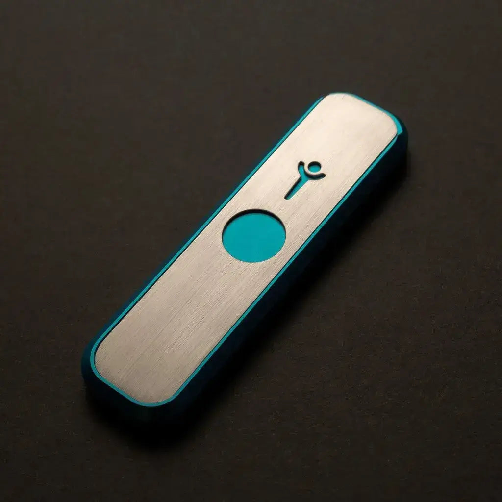Genius Pipe Mini Teal fully assembled on felt tabletop – closed view.